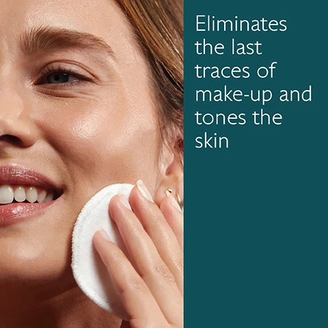 Image 1 - A woman with glowing skin is gently wiping her face with a cotton pad while smiling, and there is text that reads Eliminates the last traces of make-up and tones the skin.
Image 2 - A clear bottle of Caudalie Vinoclean moisturizing toner is surrounded by rose petals and a small fruit, with text that reads Organic rose water, Boosts glow, Vinolevure, Hydrates and strengthens, Moisturizing Toner, and 200ml, 6.7 fl oz.
Image 3 - Three bottles of Caudalie skincare products are arranged on a light green background, labeled as Large format 400mL, Standard format 200mL, and Travel format 100mL.
Image 4 - A translucent bottle of Caudalie Vinoclean Moisturizing Toner is displayed with a pink rose and green leaves, alongside the text How to recycle the Moisturizing Toner? and Recycle the bottle and cap in the recycling bin.
Image 5 - Image shows two toner bottles side by side, with Vinopure Toner on the left, a light green bottle labeled with Caudalie, and Vinoclean Toner on the right, a clear bottle also labeled with Caudalie; text beside each bottle lists benefits: Vinopure Toner reduces pores and blemishes, purifies and mattifies skin, and is suitable for acne-prone skin, while Vinoclean Toner removes last traces of makeup residue, soothes and hydrates skin, and is suitable for all skin types.
Image 6 - Two hands holding bottles of skincare products with labels that read Step 1 Cleansing Almond Milk and Step 2 Moisturizing Toner, both from the brand Caudalie.
Image 7 - Five bottles of Caudalie skincare products are arranged in a row, labeled as Micellar Water, Make-up Removing Oil, Cleansing Milk, Instant Foaming Cleanser, and Moisturizing Toner.