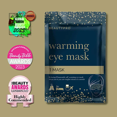 Image 1 - Image shows a dark blue package labeled warming eye mask featuring gold accents and a graphic of a person wearing an eye mask; visible text includes 1 MASK, Relaxing Chamomile self warming eye mask, and award stickers for GLOBAL GREEN BEAUTY AWARDS 2023, BeautyBible AWARDS 2023, and PURE BEAUTY AWARDS LONDON 2022 Highly Commended. Image 2 - A blue eye mask with gold speckles is displayed, accompanied by text describing its features: chamomile scent for relaxation, self-heating for 20 minutes of warmth, and suitability for travel options like plane or car. Image 3 - The image shows a product package for a warming eye mask with a navy blue background featuring gold dots, and it includes a five-star rating, the text WARMING EYE MASK, and a quote about the products comfort and relaxing scent.