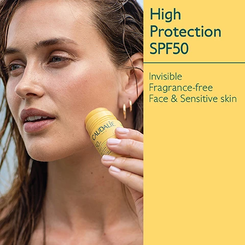 Image 1 - A woman with wet hair applies a yellow stick sunscreen to her cheek, with text alongside reading High Protection SPF50, Invisible, Fragrance-free, Face & Sensitive skin.
Image 2 - Image shows a yellow background with a round container of cream, a yellow stick sunscreen labeled CAUDALIE with SPF 50, and a small green fruit, accompanied by text highlighting organic buriti oil, moisturizing properties, and grapeseed oil as an antioxidant.
Image 3 - A hand holding a yellow sunscreen stick above water, with the text Non-greasy, water-resistant formula visible.
Image 4 - Image shows the Vinosun Protect line of sunscreen products by Caudalie, featuring a yellow background and six products labeled as Spray SPF30/50, Cream SPF30/50+, Stick SPF50+, Sun water SPF50+, and Lightweight Cream SPF50+.
Image 5 - Image shows two skincare products from Caudalie side by side: a yellow stick labeled High Protection Invisible Stick and a cream tube labeled Very High Protection Lightweight Cream, with check marks indicating both are for face, daily use, and fragrance-free.
Image 6 - Image shows a collection of six yellow sunscreen products from Caudalie on a sandy background, with text that reads: Suitable for children from 3 years, UVA/UVB High Protection, Green on scanner apps.