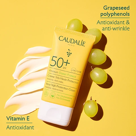 Image 1 - A yellow sunscreen tube labeled CAUDALIE 50+ SPF surrounded by green grapes and a slice of banana, with text indicating Grapeseed polyphenols Antioxidant & anti-wrinkle and Vitamin E Antioxidant.
Image 2 - A sunscreen spray bottle labeled Caudalie with a yellow background, featuring key ingredients like grapeseed polyphenols and Vitamin E, and displaying 50+ SPF and Very High Protection on the product.
Image 3 - A hand holds a yellow spray bottle labeled Caudalie 50+ with text reading Bi-phase formula and Shake before using in a light background.
Image 4 - Image shows a collection of yellow sunscreen products from the Vinosun Protect line by Caudalie, including spray, cream, stick, and sun water, each displaying their SPF ratings: Spray SPF30/50, Cream SPF30/50+, Stick SPF50, Sun water SPF50+, and Lightweight Cream SPF50+.
Image 5 - A variety of sun care products from Caudalie are displayed on a sandy surface, featuring bright yellow packaging, with text stating Suitable for children from 3 years, UVA/UVB High Protection, and Green on scanner apps.