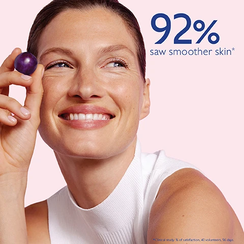 Image 1 - A smiling woman holding a small purple round object in her hand against a light pink background, with the text 92% saw smoother skin and a note about a clinical study in the corner.
Image 2 - Image depicts a tube of Caudalie Resveratrol-Lift cream surrounded by purple plums on a light pink background, with visible text highlighting benefits: Hyaluronic acids smooth and hydrate, Resveratrol anti-wrinkles, collagen booster for firm skin, and vegan collagen for lifting effect.
Image 3 - Image shows a comparison between two skincare products: on the left, a jar labeled Resveratrol-Lift Cashmere Cream, and on the right, a tube labeled Resveratrol-Lift Cashmere Fluid, with the text VS in between; below each product, checkmarks list features: Cream texture, Corrects wrinkles, Firms skin for the cream and Fluid texture, Corrects wrinkles, Firms skin for the fluid.
Image 4 - An image shows a hand holding a tube of Caudalie Lightweight Cashmere Cream against a pink background, with text that reads How to recycle and a box stating Recycle the tube and the cap in the recycling bin.
Image 5 - A collection of skincare products from Caudalie, including an Instant Firming Serum, Lightweight Cashmere Cream, Firming Eye Gel Cream, and Firming Night Cream, all displayed against a light background with steps labeled for each product: Step 1 for Instant Firming Serum, Step 2 for Lightweight Cashmere Cream and Cashmere Cream, and Step 3 for Firming Eye Gel Cream.